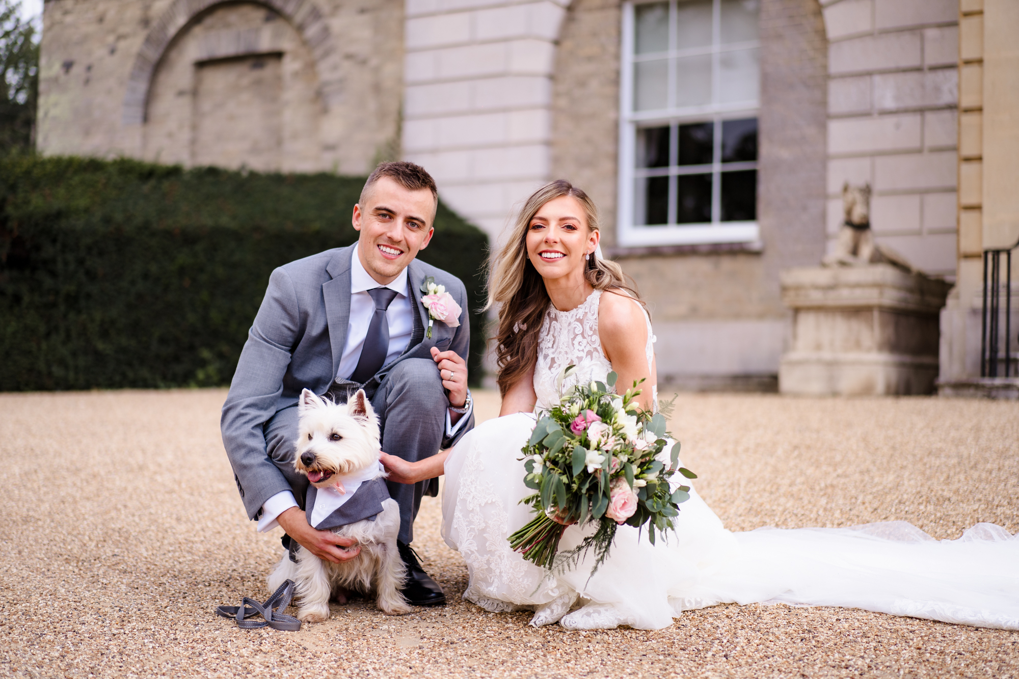 Wedding couple with dog at Hatfield Place in Essex